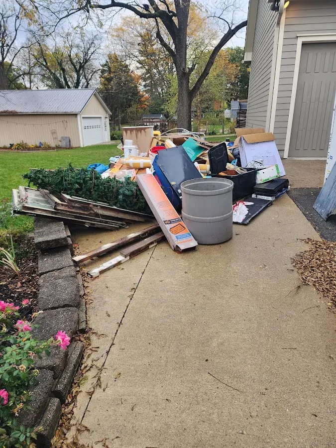 Dumpster being loaded with debris for Demolition Dumpster Rental in Fleetwood